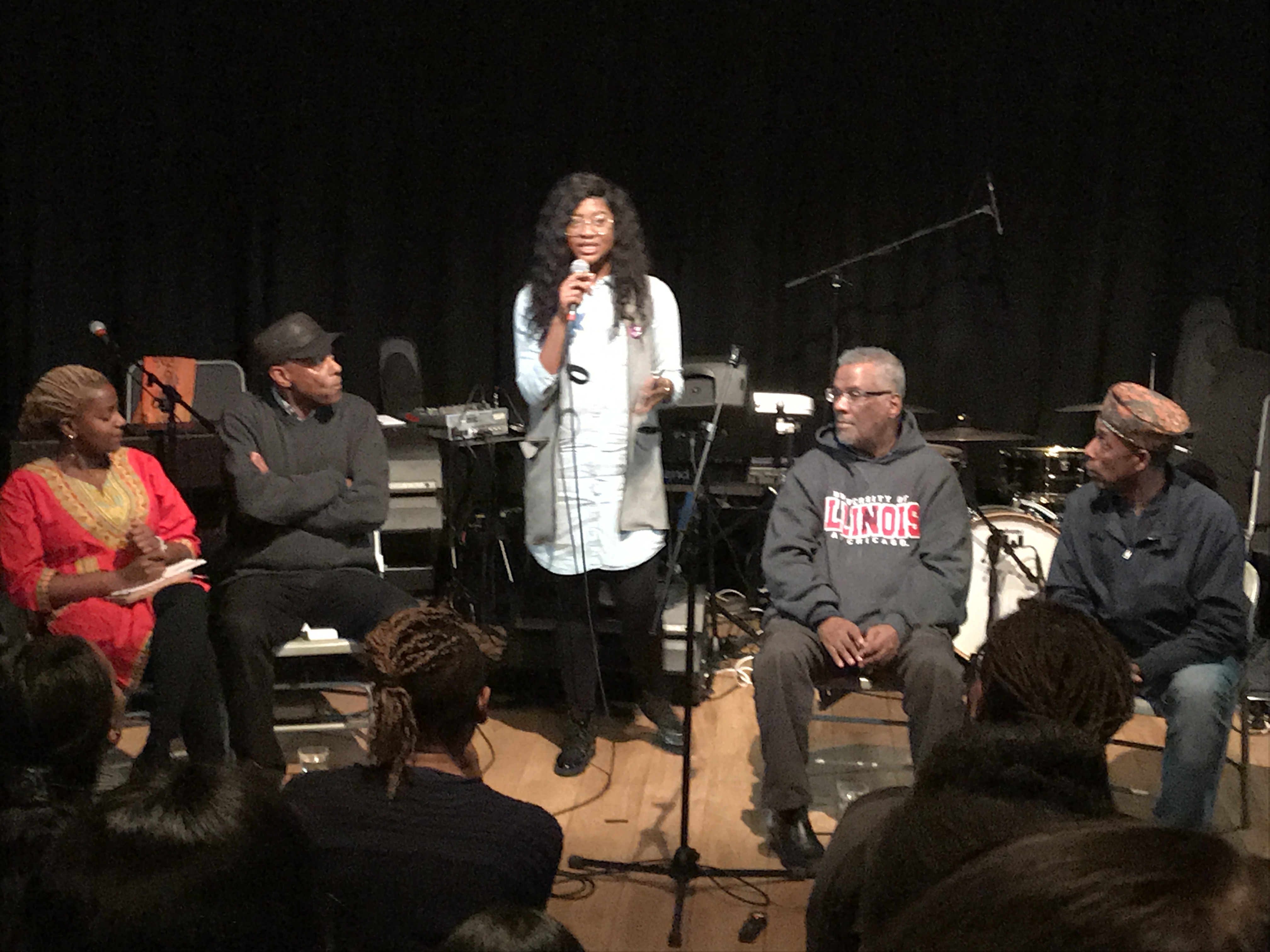 Full panel with audience at the Manchester event