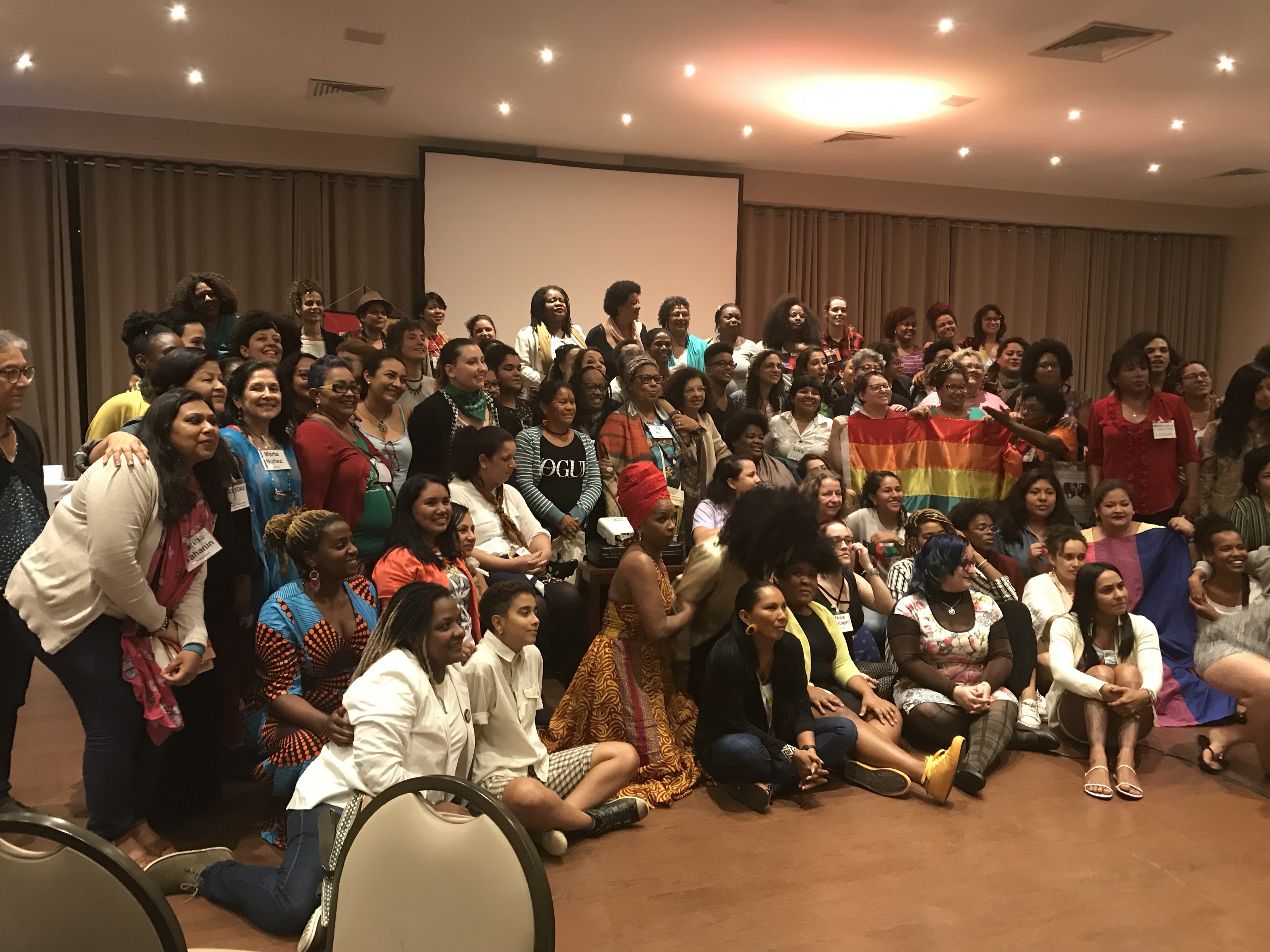 Large gathering of over 100 women at international summit