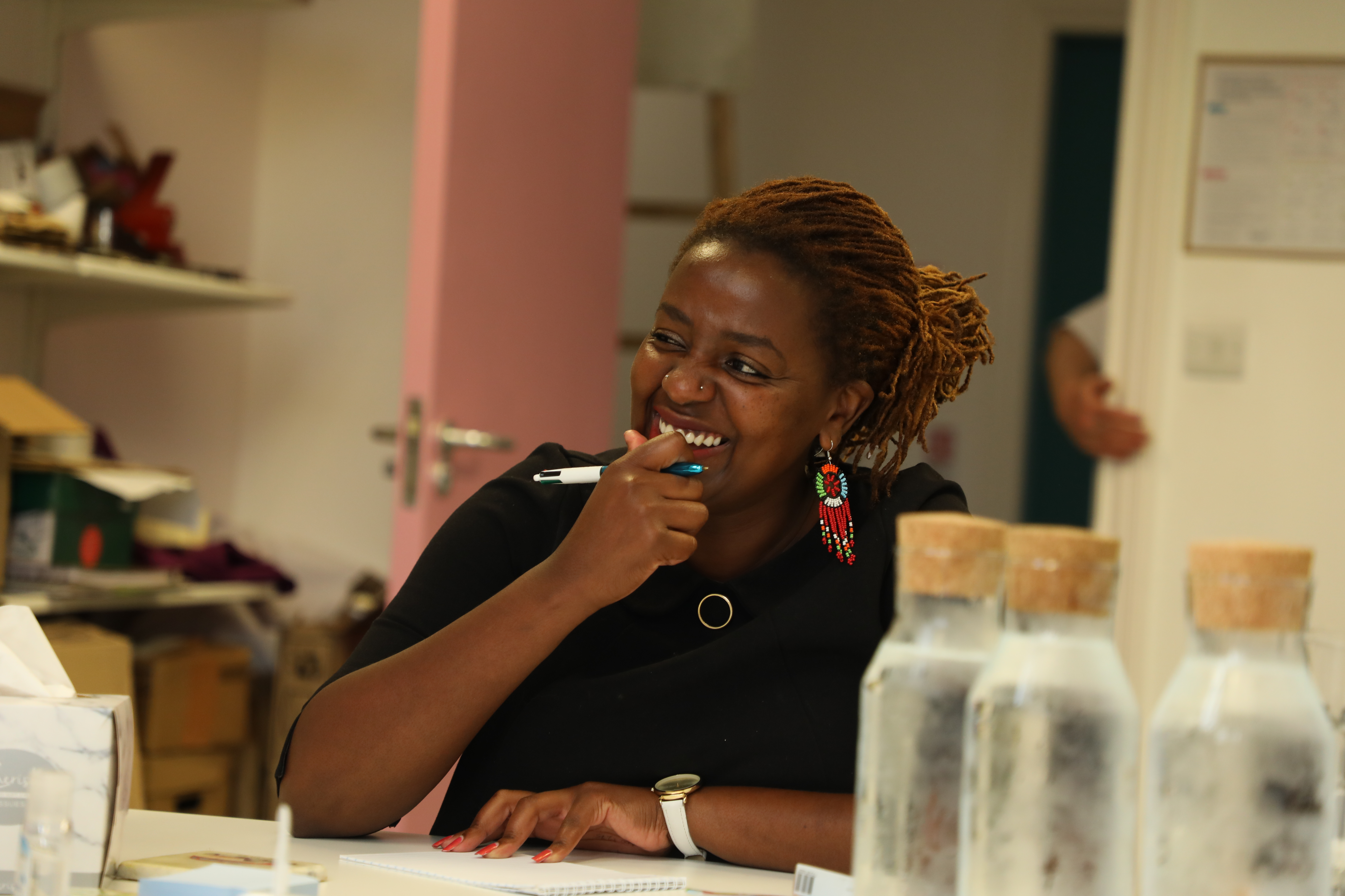 Smiling woman at a workshop